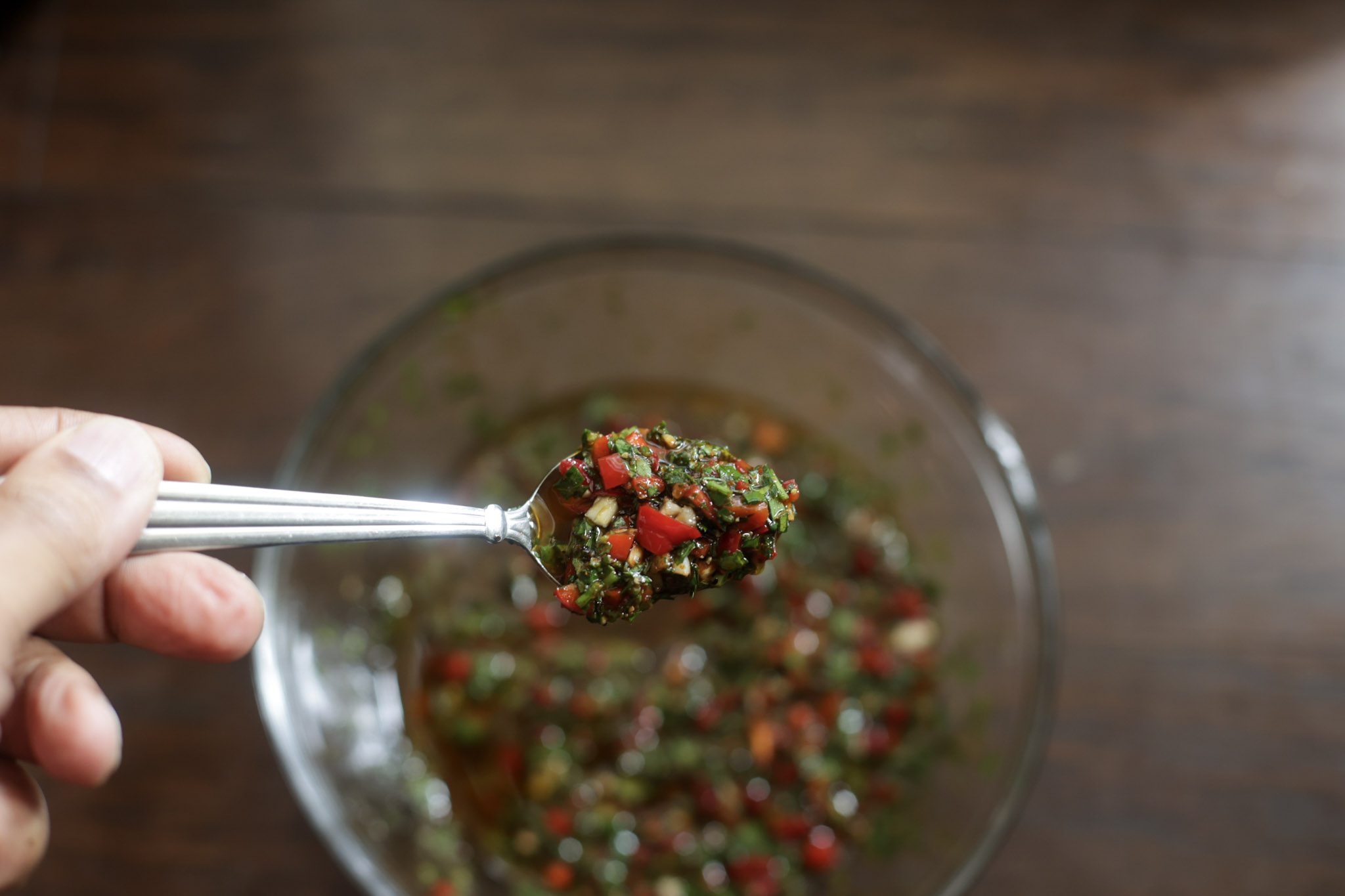 chimichurri sauce in glass bowl