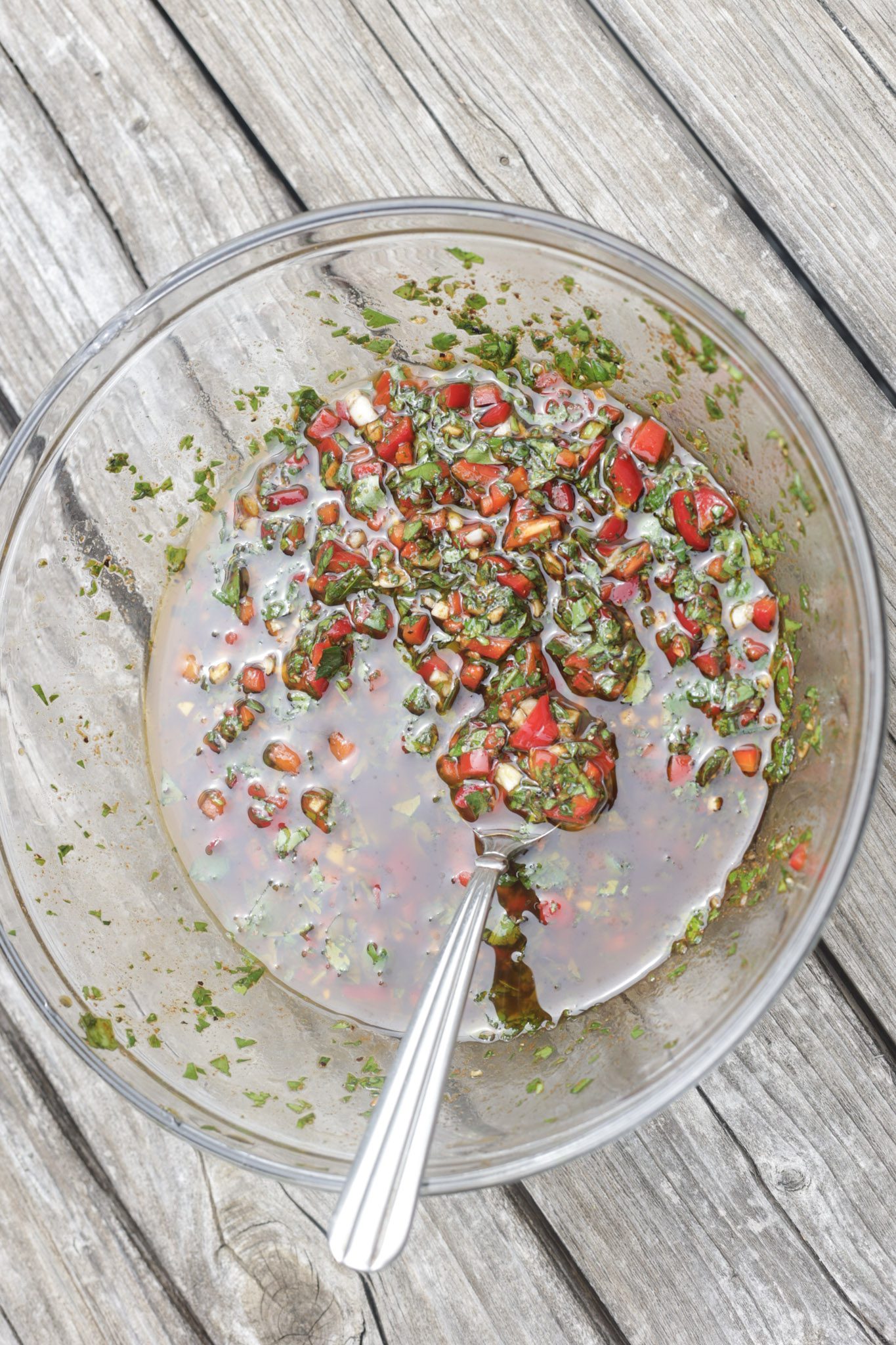chimichurri sauce in glass bowl