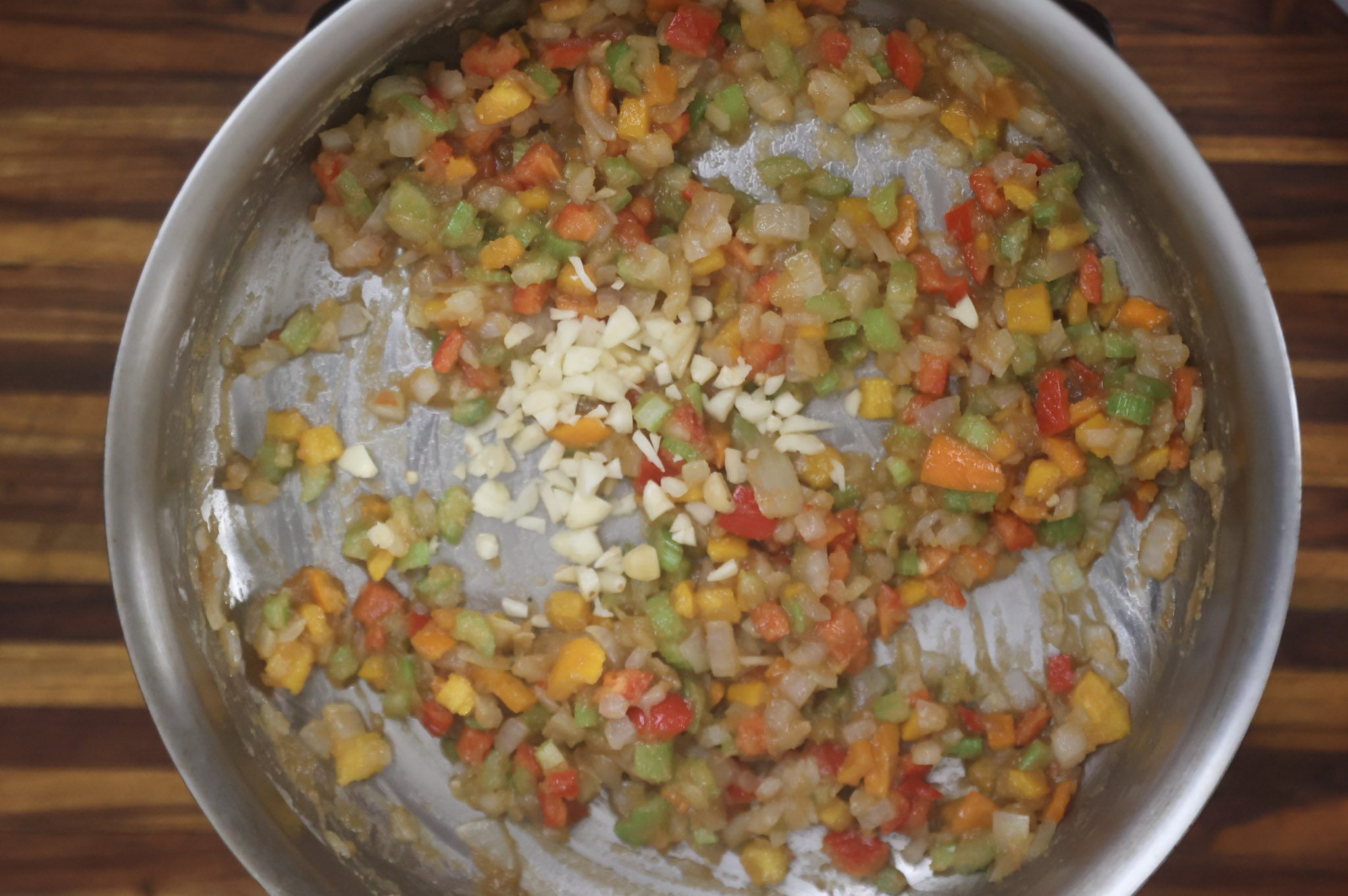 peppers, onions, celery, and garlic cooking in roux