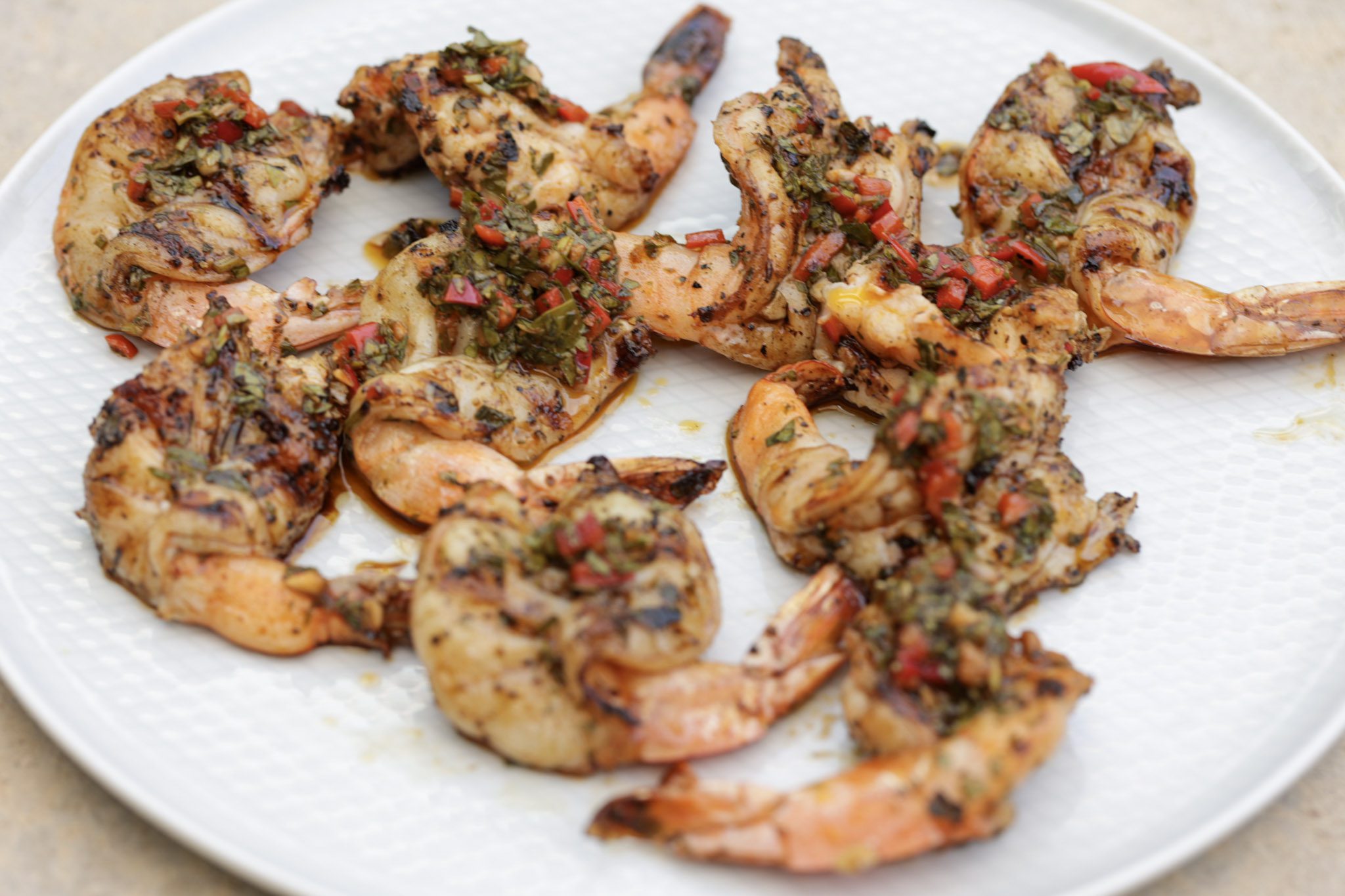 grilled chimichurri shrimp on white plate