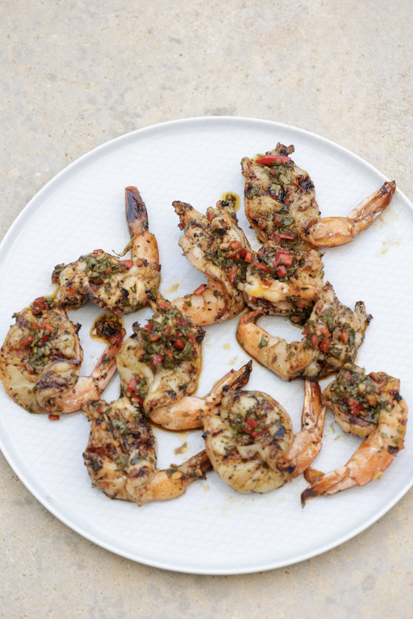 grilled chimichurri shrimp on white plate