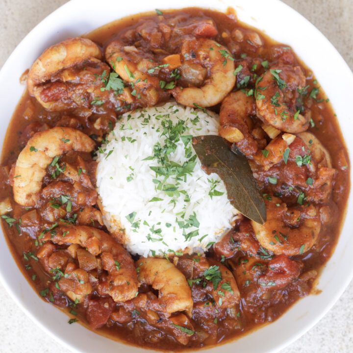 shrimp creole with rice in a white bowl