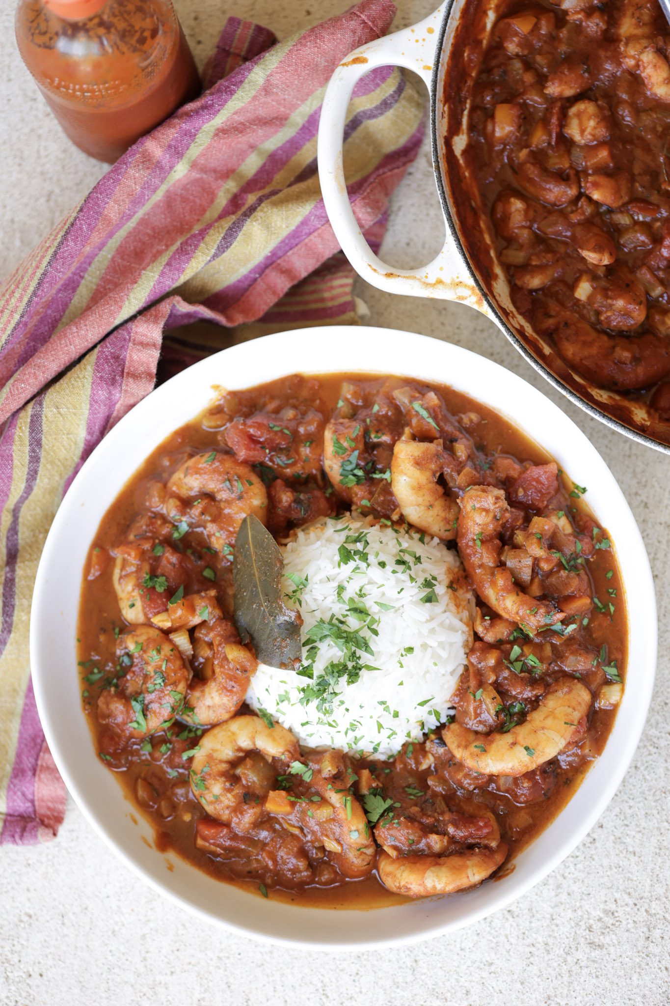 shrimp creole with rice in a white bowl