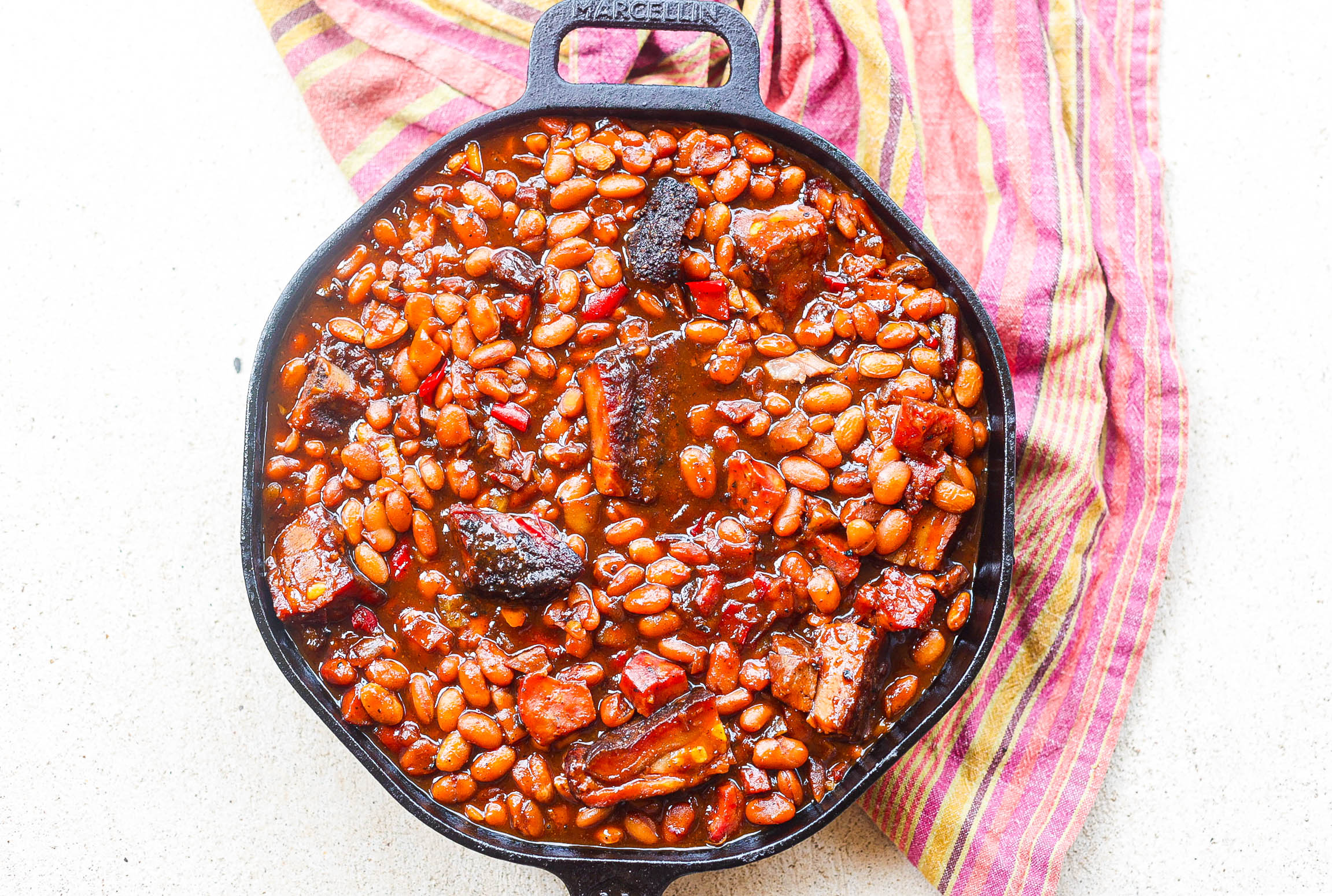 bbq beans in black cast iron skillet