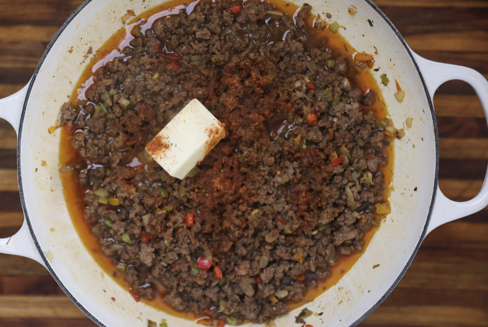 butter being added to dirty rice