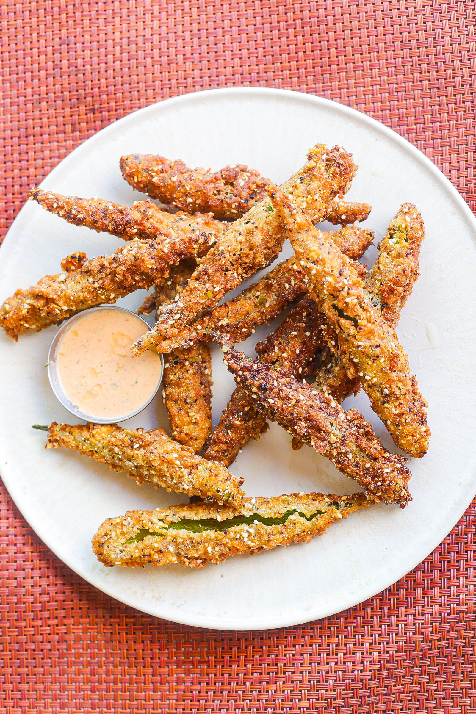 fried whole okra on white plate