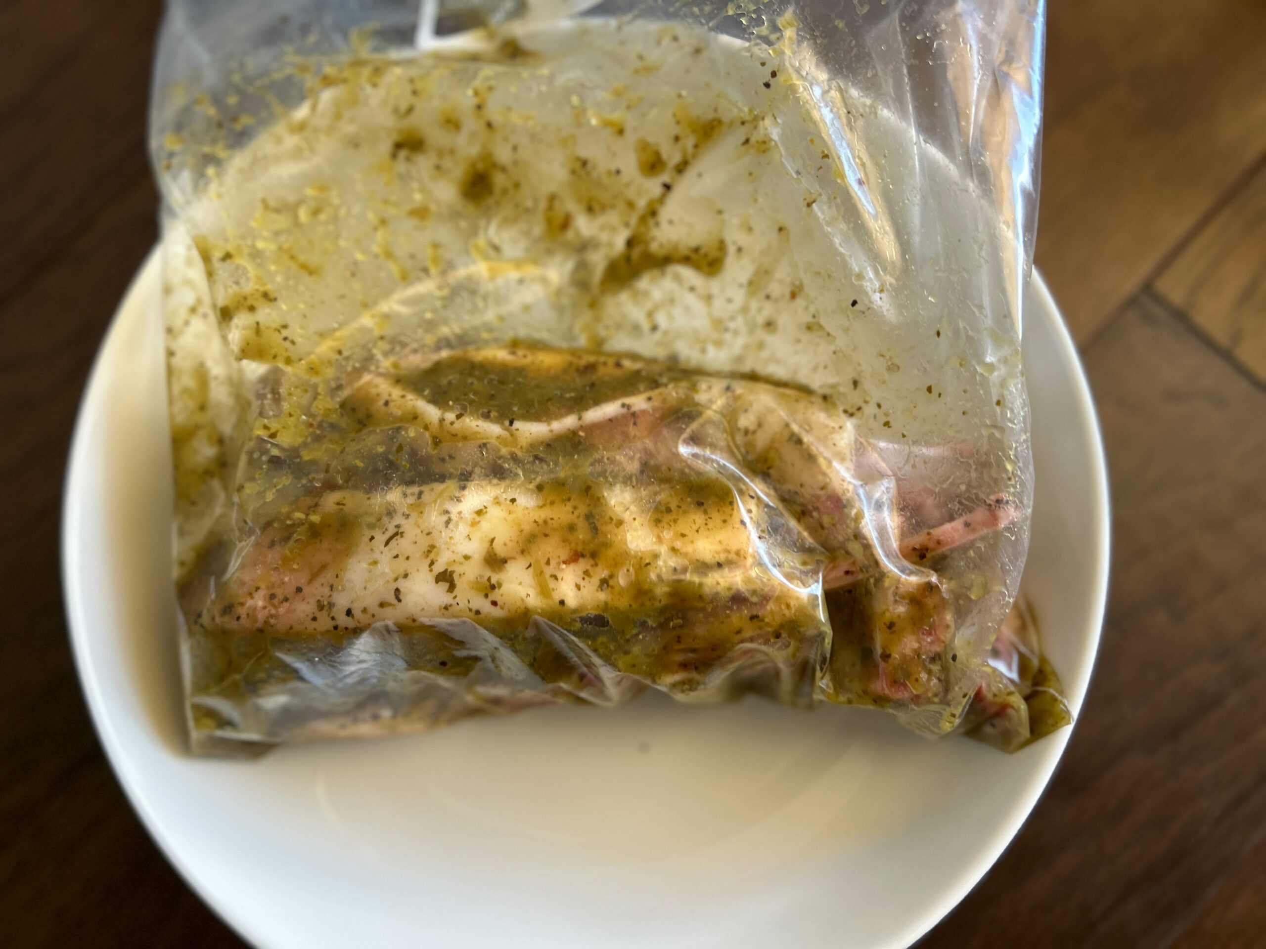 lamb chops marinating in plastic bag