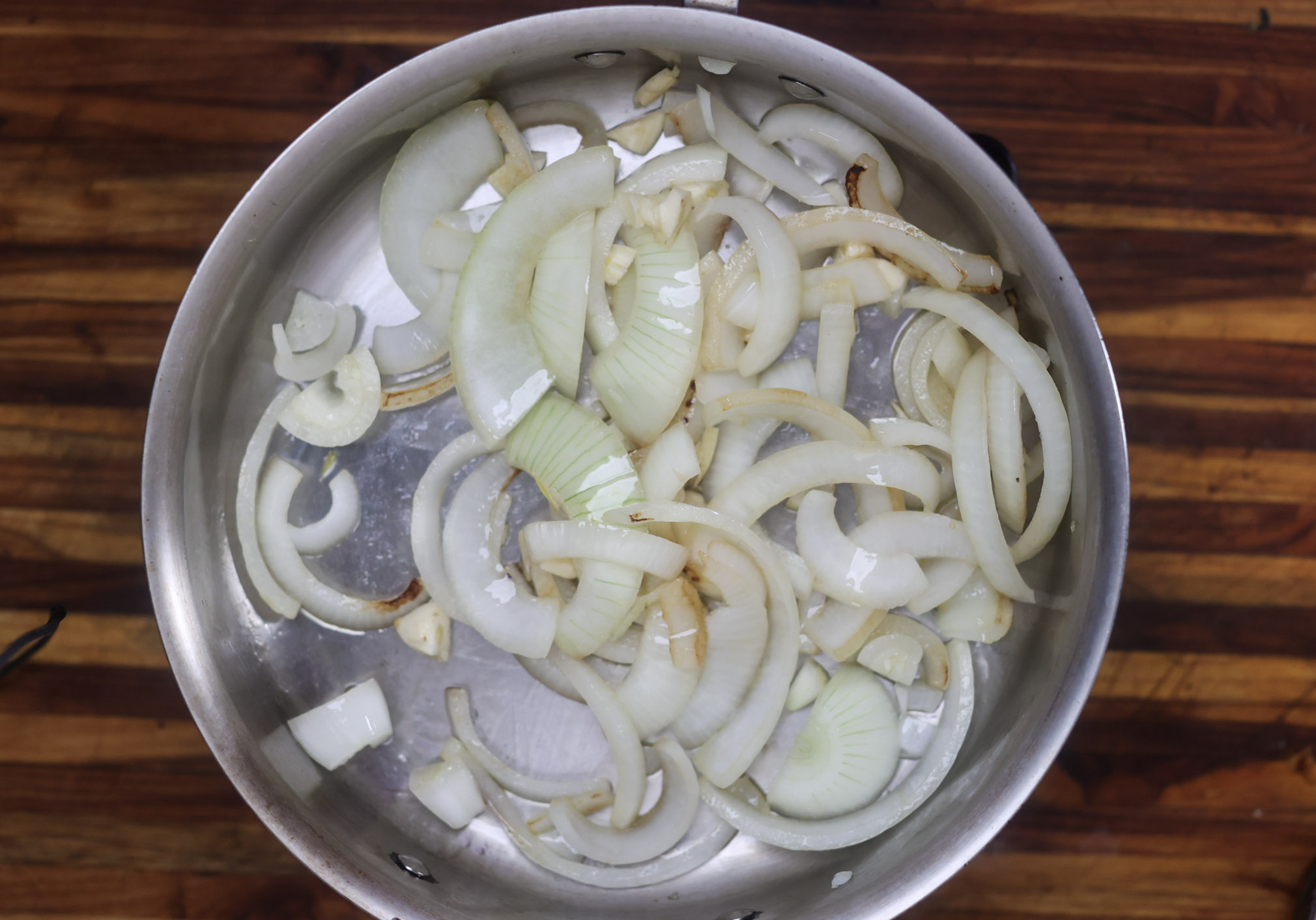 onions sauteing in pan