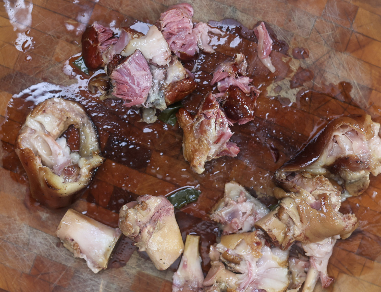 shredded ham hocks on cutting board