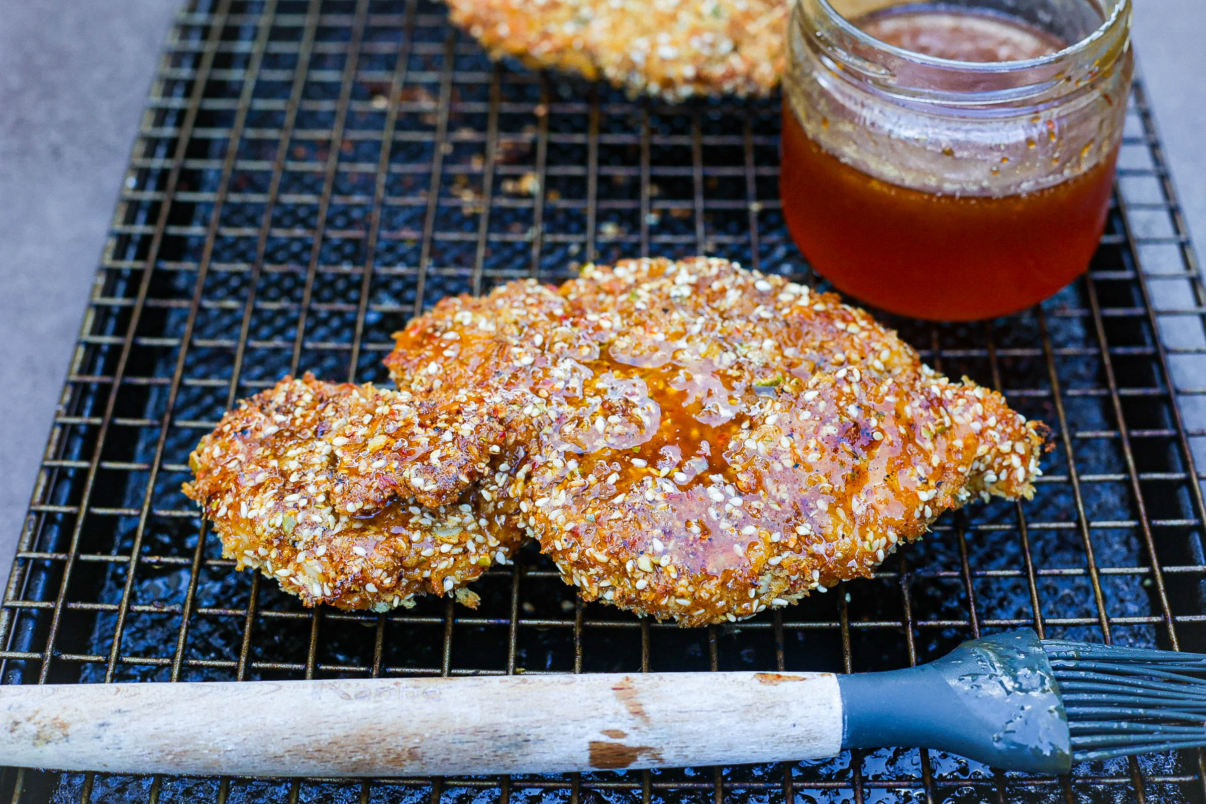 oven fried chicken breasts on wire rack lined baking sheet